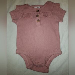Nicole Miller NY- 3/6M pink waffle onesie woth button neckline amd ruffle board